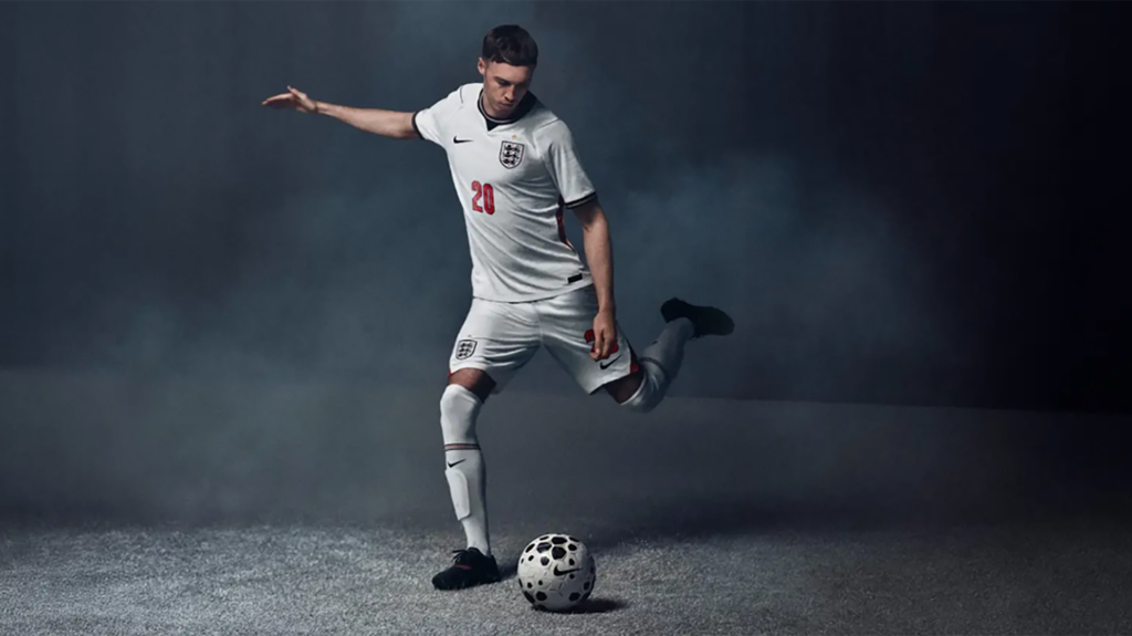 An illustration of Cole Palmer, a soccer player wearing the English national team jersey with the number 20. He is sharing to kick a soccer ball with his left foot.