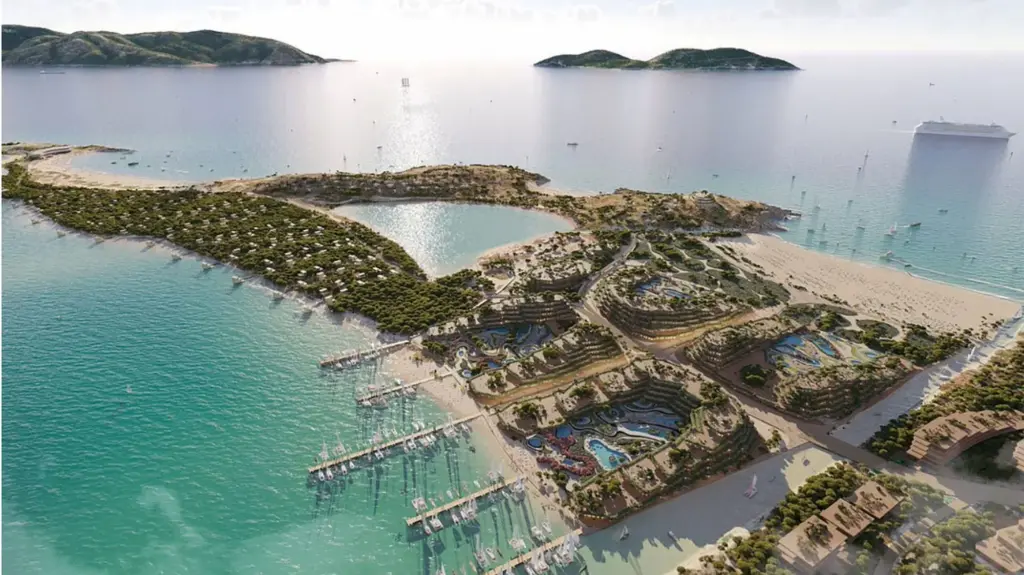 A resort on a sand spit in gorgeous seas.
