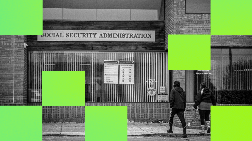 A black-and-white photo of two people walking up to a building with a sign that reads 