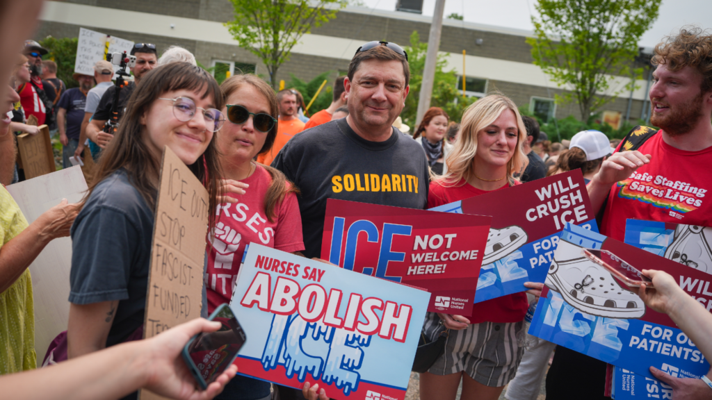 Troy Jackson, wearing a black shirt with the word