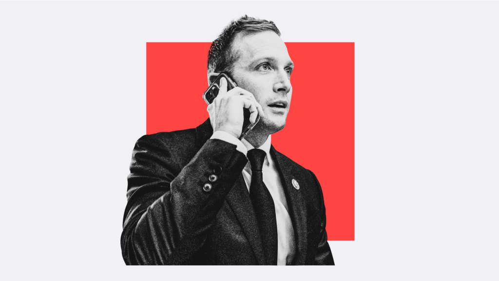 A photo collage of a young Caucasian man in a suit in black and white against a red square.