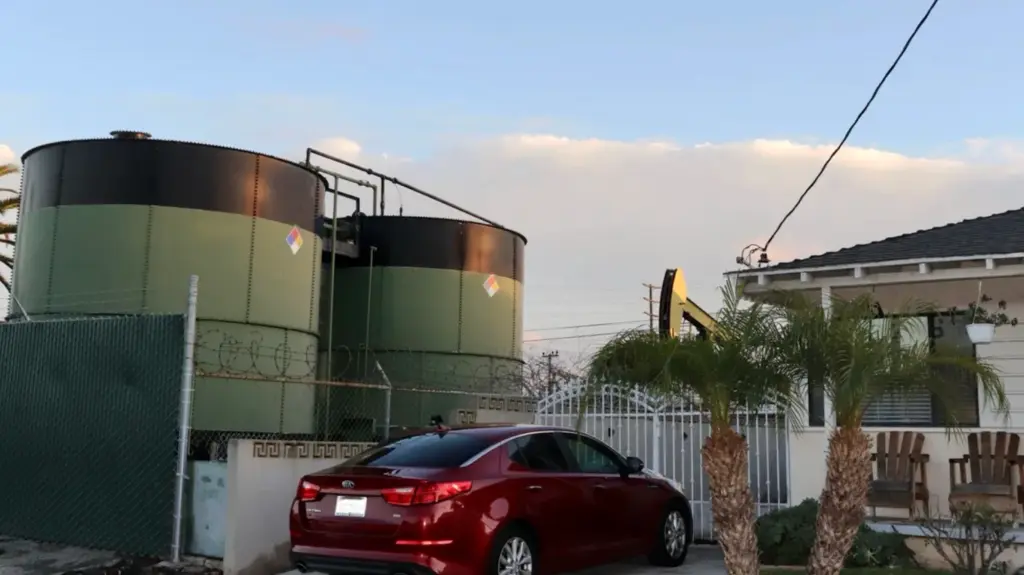 A California bill now awaiting the governor's signature would direct $5 million collected from penalized oil wells in Inglewood into direct cash aid for 1,000 nearby households with qualifying respiratory or reproductive health impacts.