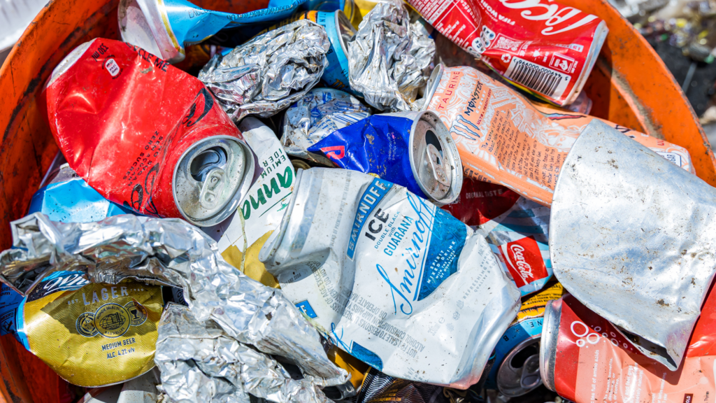 Crushed pile of aluminum soda cans