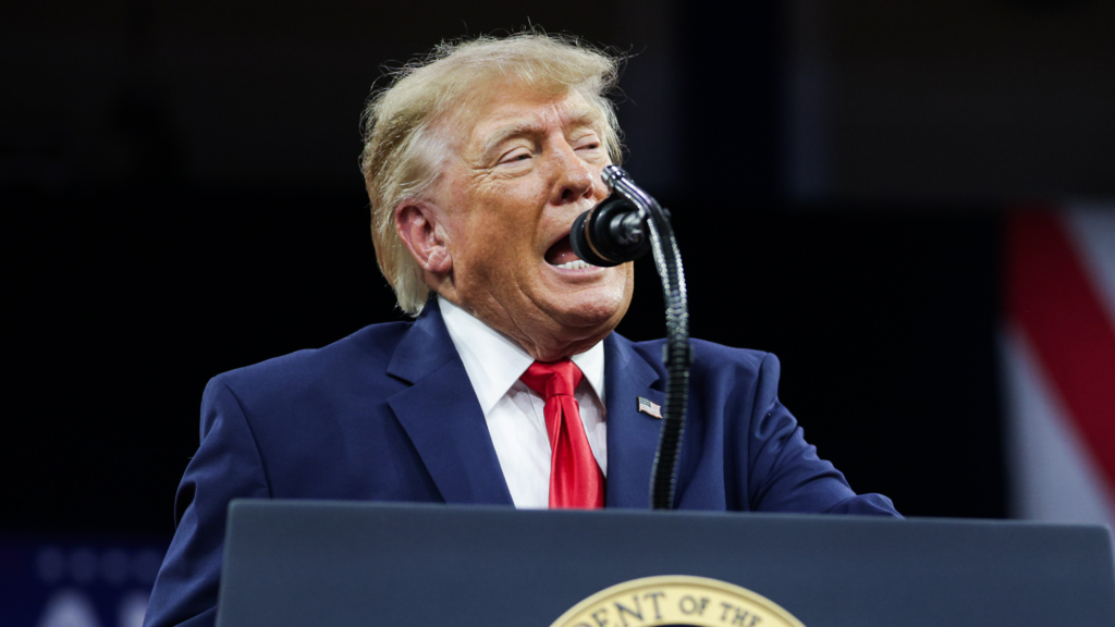 Trump at podium.