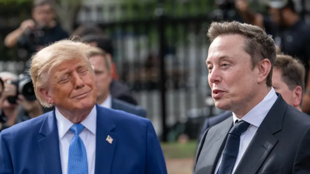 President Trump and Elon Musk stand together outside the White House